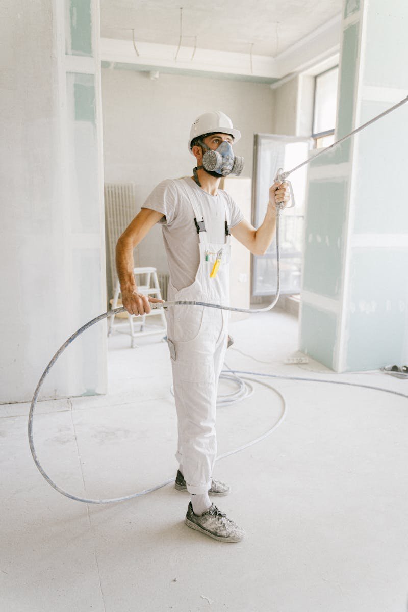 A Man Renovating a Home